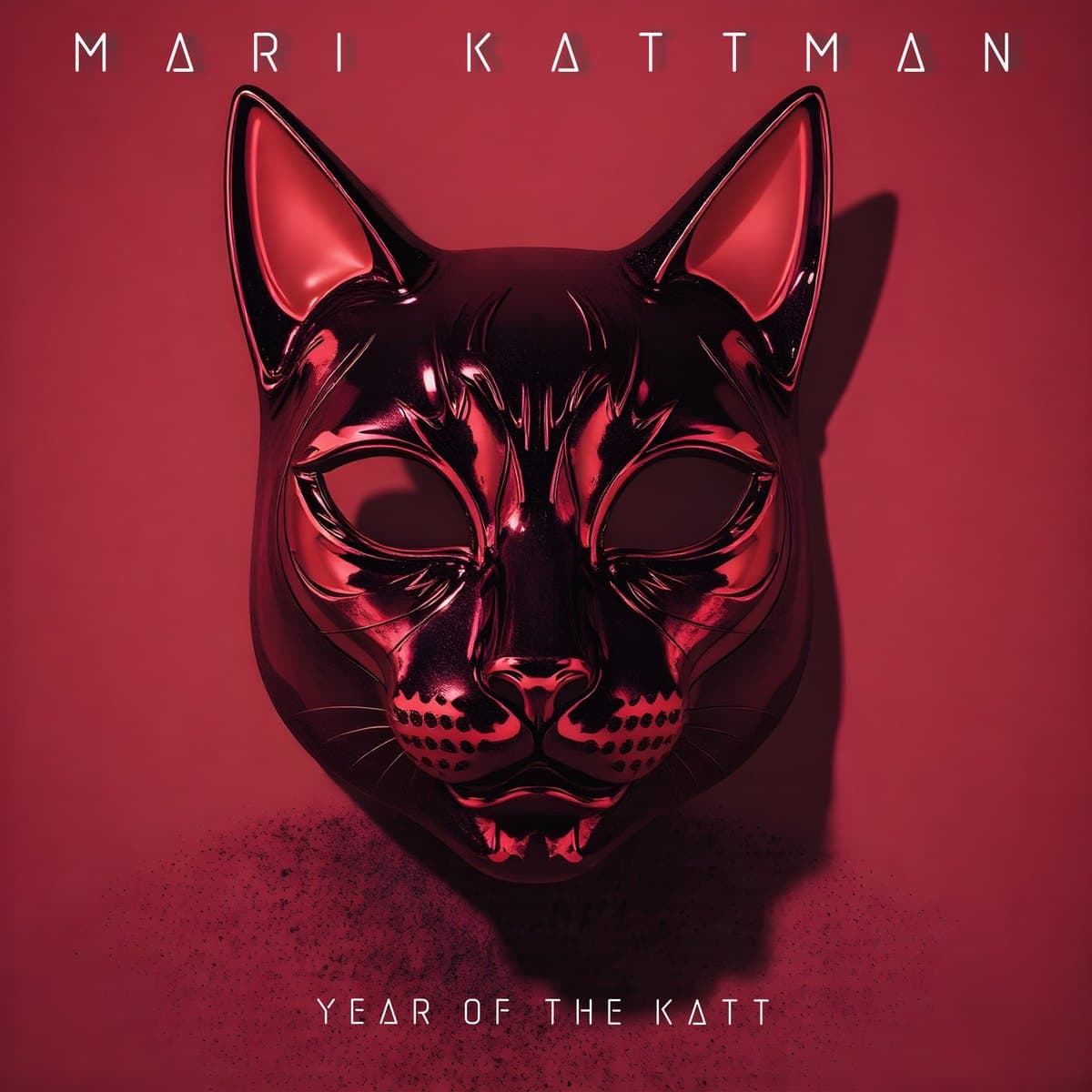 Cover of Year Of The Katt: a glossy red cat mask on crimson